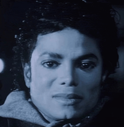 black and white image of michael jackson looking disgusted